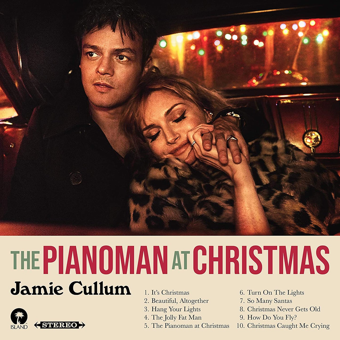 Jamie Cullum's "The Pianoman at Christmas" CD cover featuring a man and woman in a car.