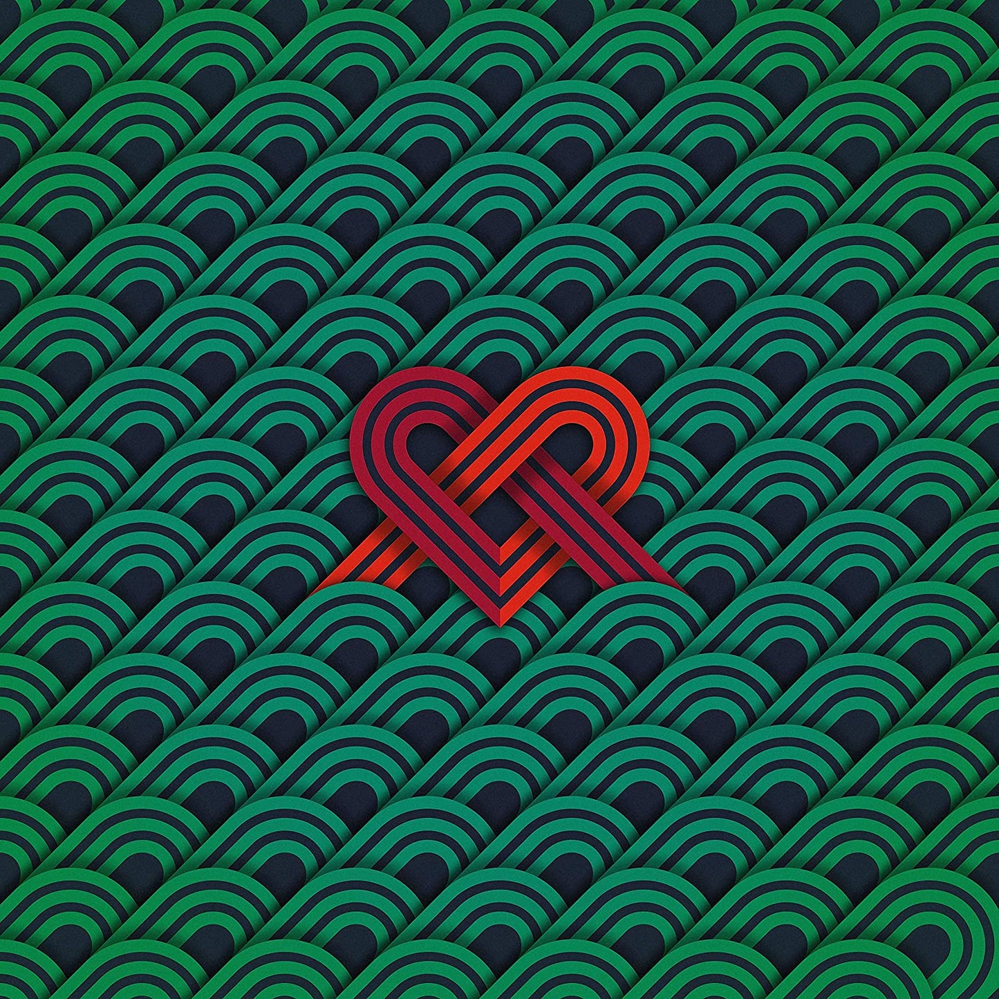 The image shows a red heart-shaped knot on a green patterned background.