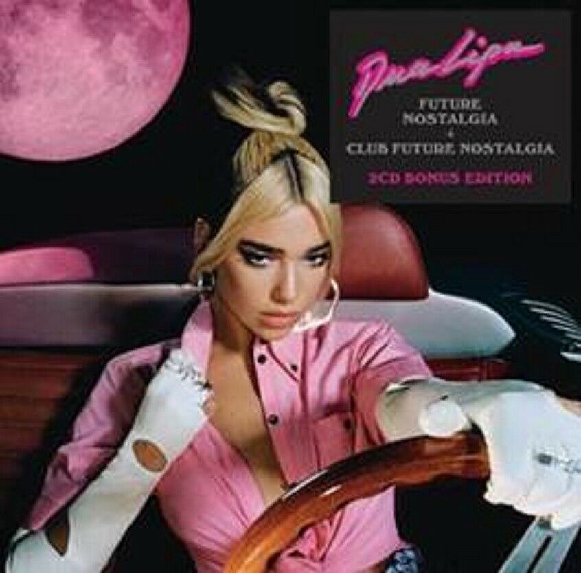 Dua Lipa in a pink shirt, driving a car, under a pink moon.