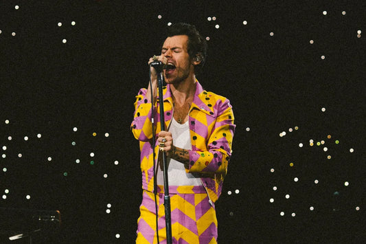 Harry Styles performing live as a solo artist