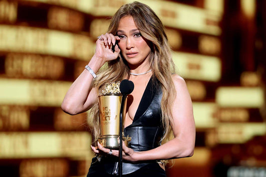 Jennifer Lopez winning an award