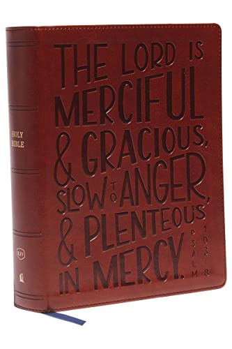 Brown leather Bible with embossed Psalm 103:8 text on the cover.