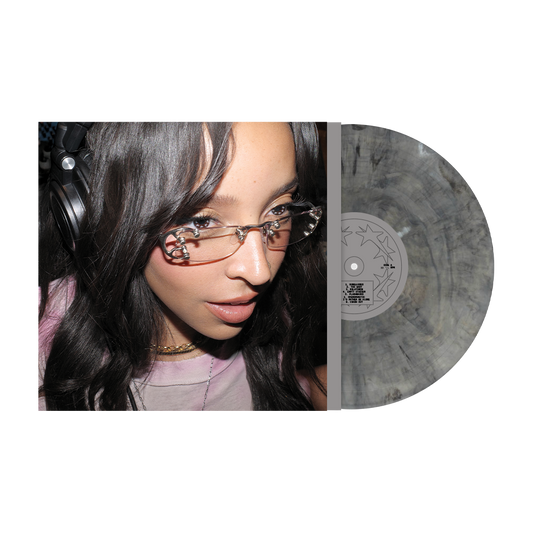 Tinashe album cover and silver & black swirl vinyl record.
