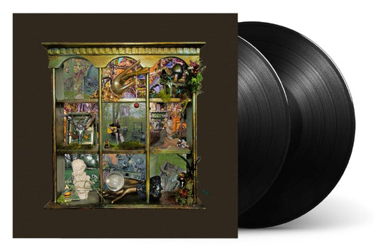 Billy Strings album cover: ornate diorama with a musician playing guitar.
