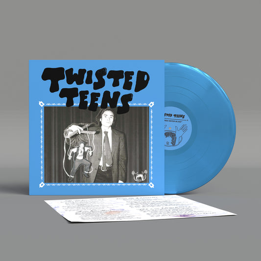 Blue vinyl LP with album cover featuring a portrait and handwritten text.