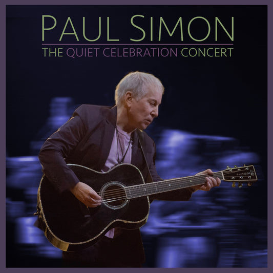 Paul Simon playing acoustic guitar on stage, album cover art.