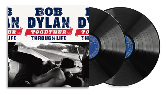 Bob Dylan’s “Together Through Life” vinyl record with a highway image.