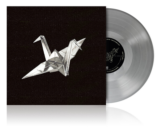Coldrain vinyl record with black cover featuring a silver origami crane.