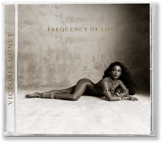 CD cover for Victoria Monét's "Frequency of Love" featuring a reclining woman.