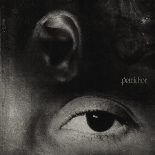 Black and white album cover featuring an eye and ear, text “Petrichor”.