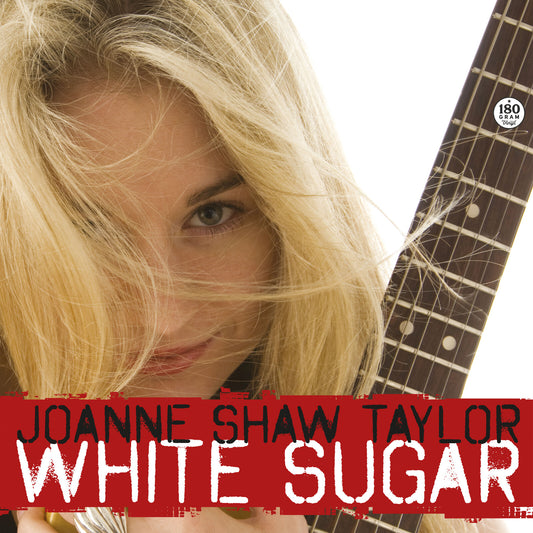 Album cover for Joanne Shaw Taylor’s “White Sugar” featuring a portrait and guitar.