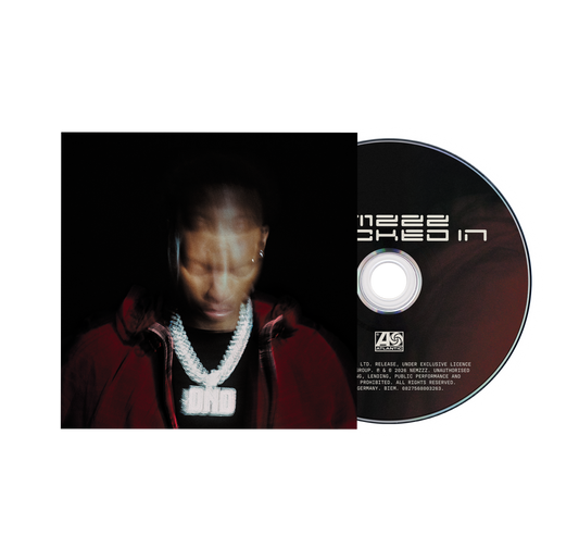 CD case featuring a portrait of a man with a silver grill and text.