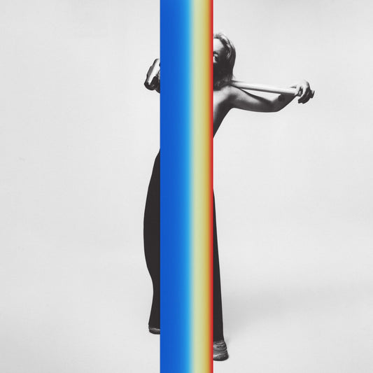 Black and white portrait split by a vertical blue-to-red gradient.
