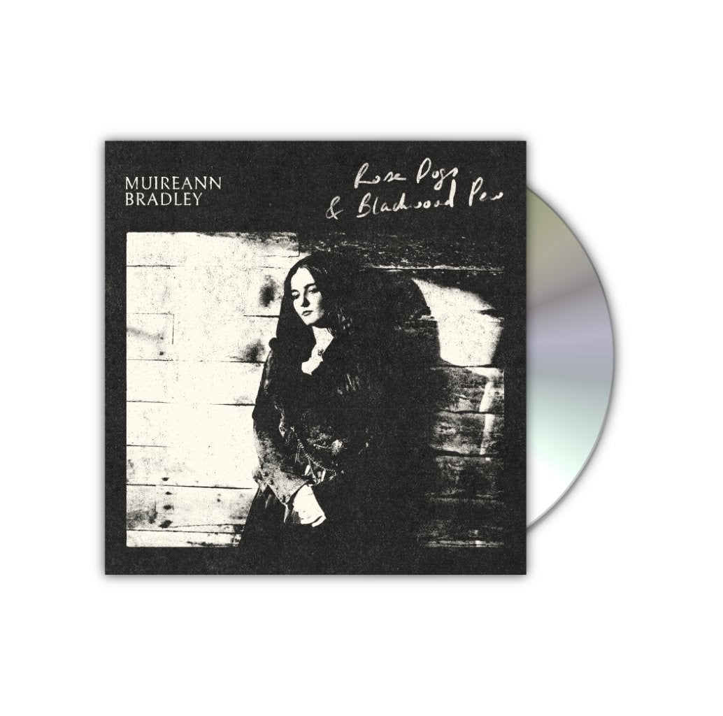 CD cover with a portrait of a woman in a dark dress.