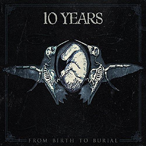 "Album cover with a fetus skeleton on a black background, surrounded by a border."