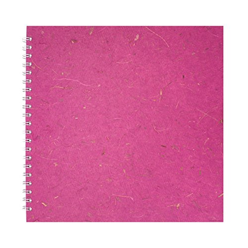 Pink spiral-bound notebook with textured, flecked paper.