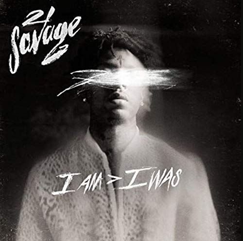 Black and white portrait of 21 Savage with eyes obscured by a white brushstroke.