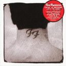 Foo Fighters album cover, black and white with red circular sticker.