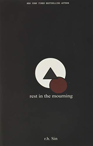 Black book cover with a white circle containing a dark triangle.
