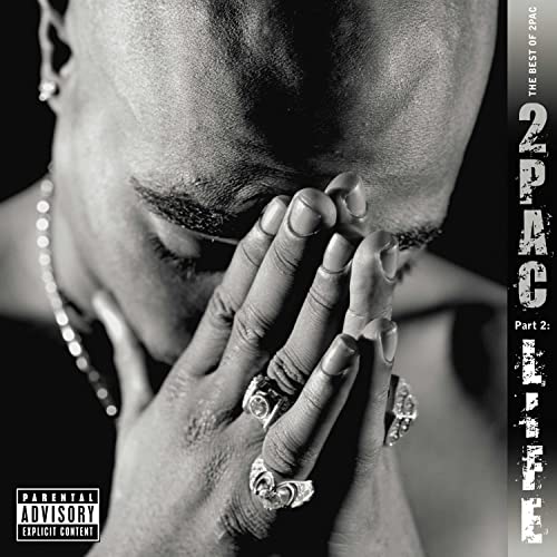 2Pac album cover: close-up of rapper with hands covering face.