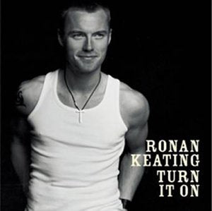 Black and white album cover featuring Ronan Keating in a tank top.