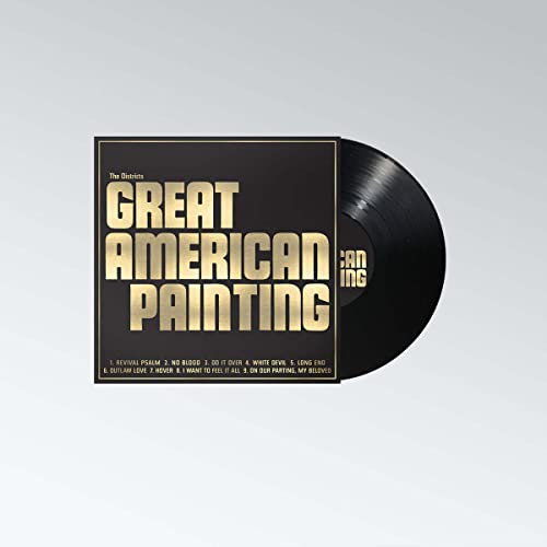 Vinyl record with album cover featuring gold text on a black background.