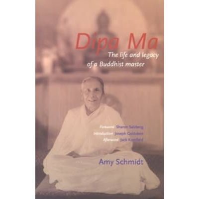 A book with a simple cover featuring a portrait of an elderly Buddhist woman.