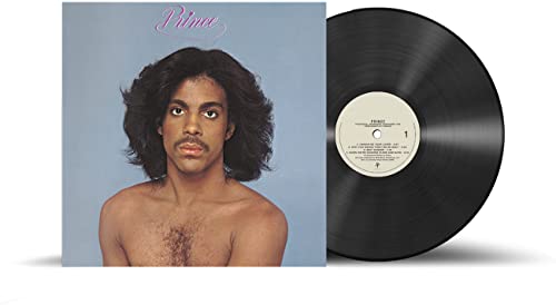 Prince album cover and vinyl record featuring a portrait of the artist.
