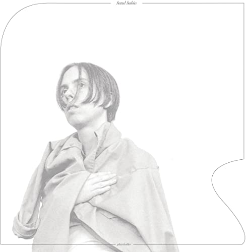 Black and white vinyl record cover featuring a portrait of a person.