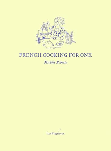 Cookbook with French recipes, likely featuring images of dishes and kitchen utensils on cover.