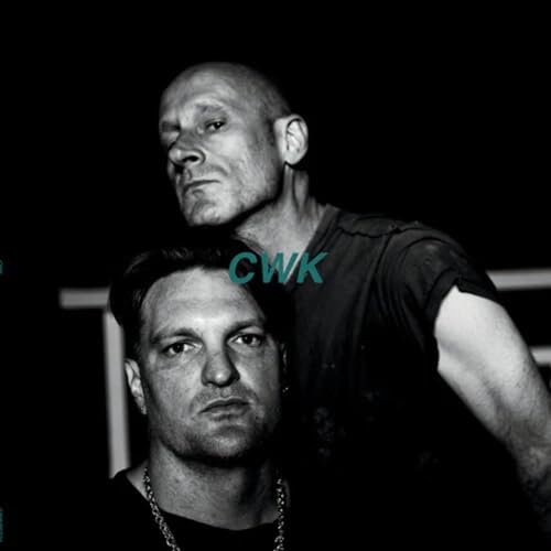 Black and white portrait of two men, with "CWK" text overlay.