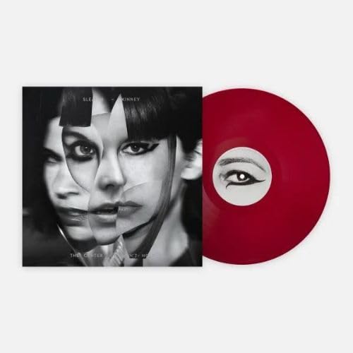 Sleater-Kinney album cover and red vinyl record with eye detail.