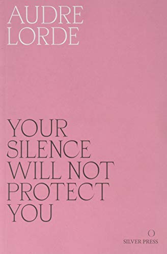 Book with essays and poems, dark cover, white text, likely featuring Audre Lorde's work.