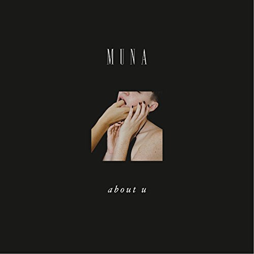 Album cover for Muna’s “About U” featuring hands around a face.
