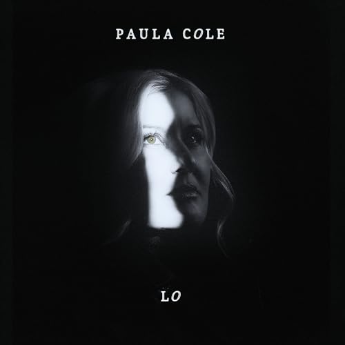 Paula Cole's "Lo" CD cover: portrait with dramatic lighting and shadows.