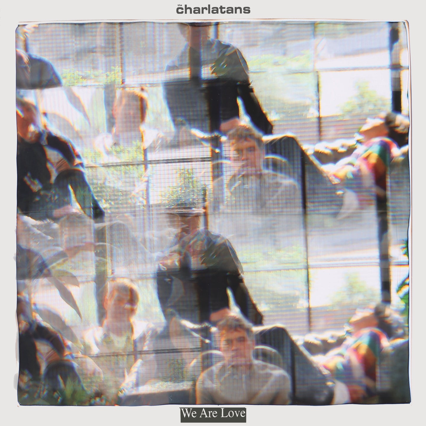 Album cover with a collage of people and text 'charlatans© We Are Love'.