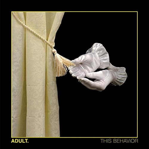 White-gloved hand pulling a patterned curtain tieback, yellow border.