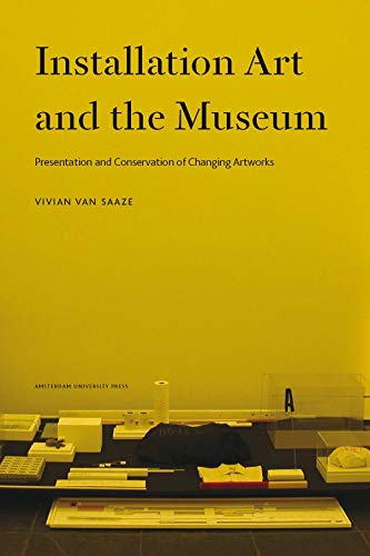 Yellow book cover with black text and a table of art supplies.