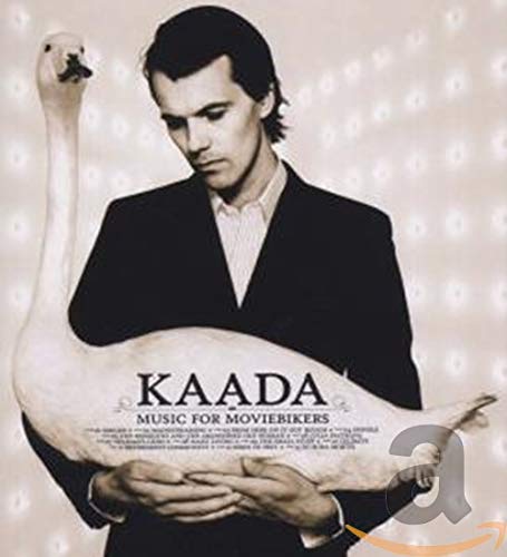CD cover: man in suit holding a white swan, patterned background.