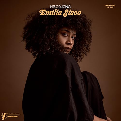 Album cover featuring Emilia Sisco with large afro, looking over shoulder.