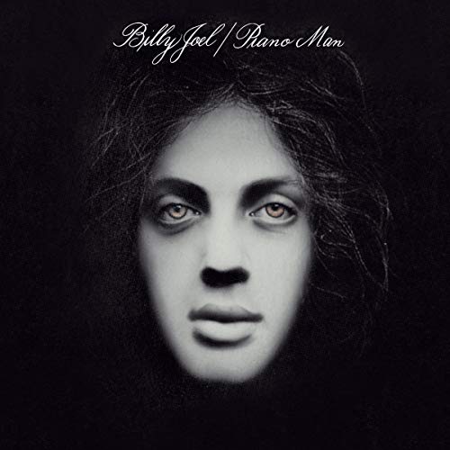 Black and white album cover featuring a close-up portrait of Billy Joel.