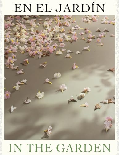 Pink and white flower petals scattered on a soft grey surface with leaf shadows.