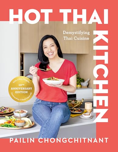 Cookbook cover featuring a woman with Thai food, titled "Hot Thai Kitchen".