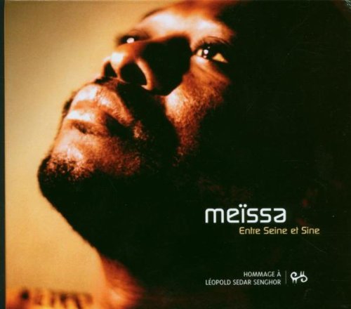 CD cover featuring a close-up, low-angle portrait of a dark-skinned man.
