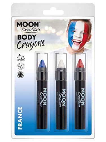 "Three black body crayons in packaging with a child having a painted French flag face."