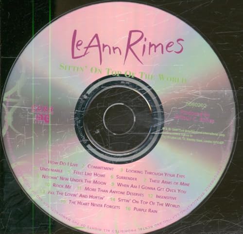 LeAnn Rimes “Sittin’ On Top Of The World” CD with tracklist visible.