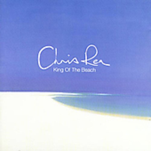 Chris Rea album cover: beach scene with blue sky and white script.