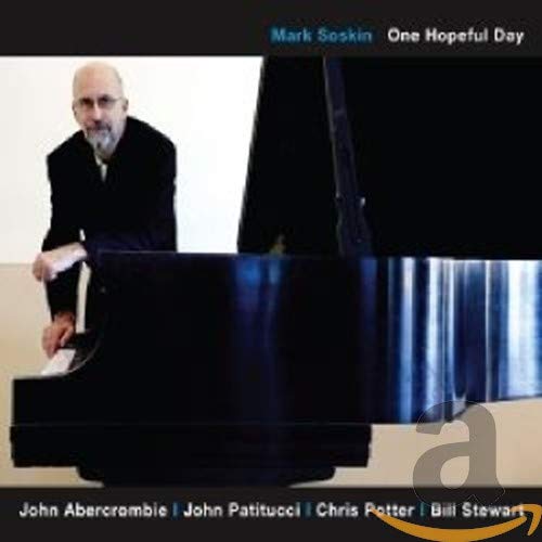 CD cover featuring pianist Mark Soskin and a dark piano, with text.