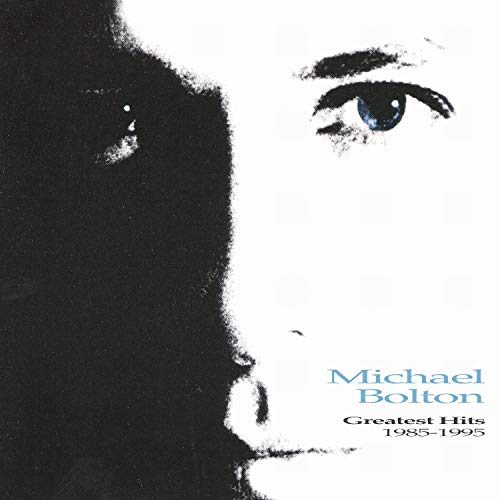 Michael Bolton’s “Greatest Hits” CD cover, featuring a close-up of his face.