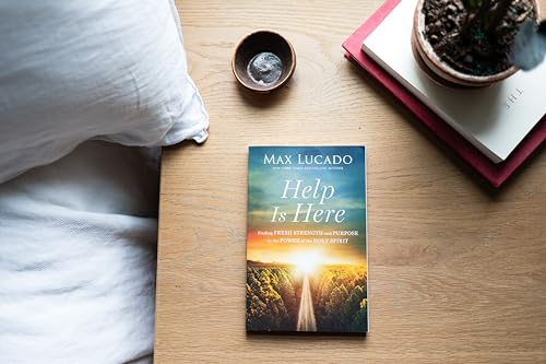 Book cover, “Help Is Here” by Max Lucado, with a sunrise landscape.